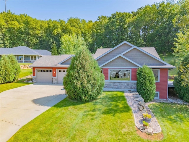 view of front facade with a front lawn and a garage