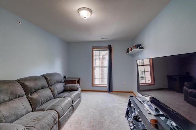 living room featuring light carpet