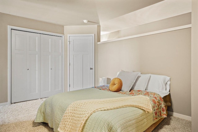 bedroom with a closet and carpet floors