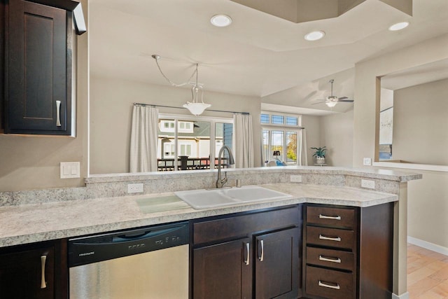 kitchen with sink, ceiling fan, dishwasher, and dark brown cabinetry