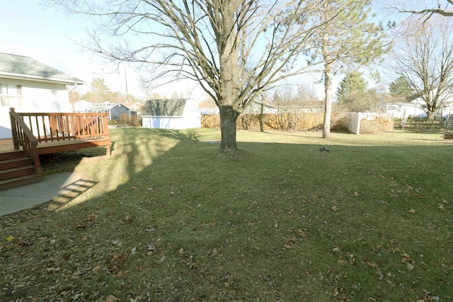 view of yard featuring a deck