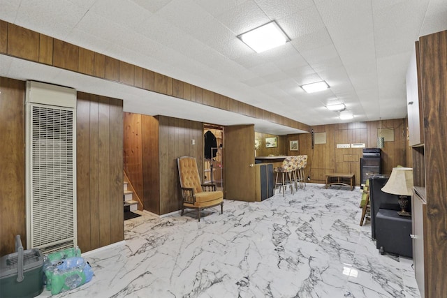 interior space featuring wooden walls