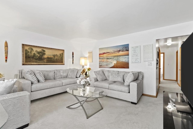 living room featuring light carpet