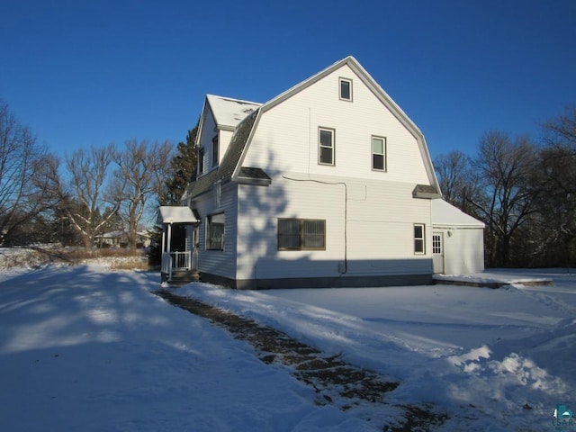 view of snow covered property