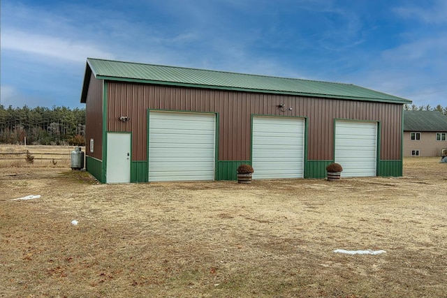 view of outdoor structure with a garage