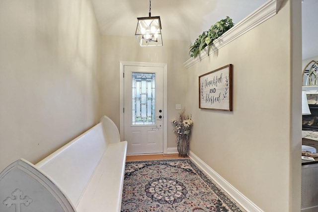 foyer featuring an inviting chandelier