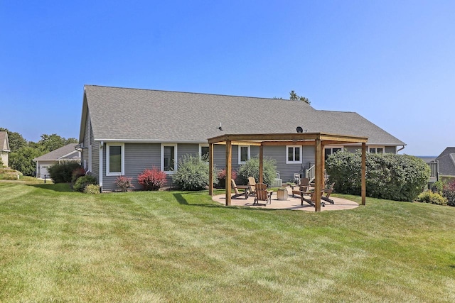 back of property featuring a patio and a lawn