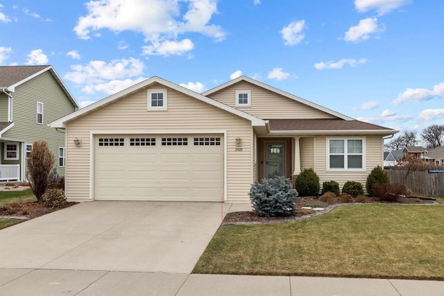 view of front facade with a front lawn and a garage