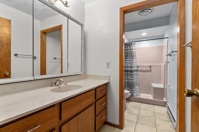 bathroom with baseboard heating, tile patterned flooring, a shower with shower curtain, and vanity