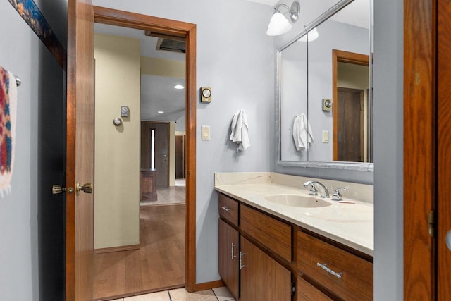 bathroom with vanity and tile patterned floors