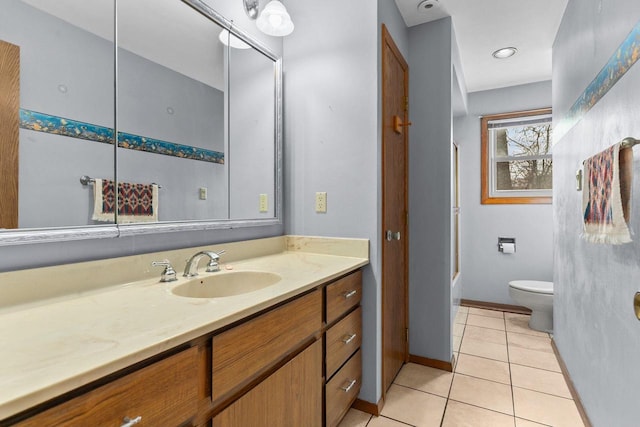 full bathroom featuring toilet, tile patterned flooring, enclosed tub / shower combo, and vanity