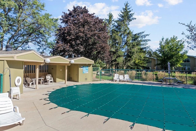 view of pool featuring a patio area