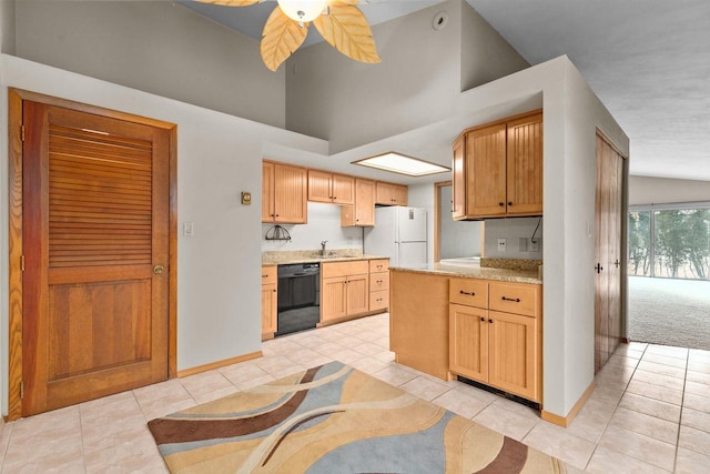 kitchen with sink, white fridge, black dishwasher, ceiling fan, and light tile patterned floors