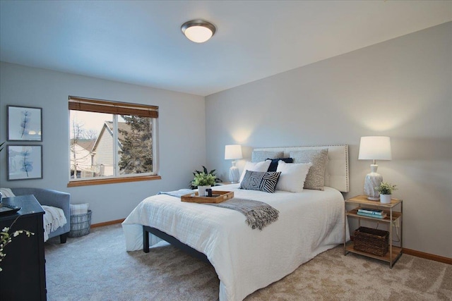 bedroom with light carpet