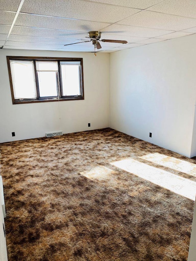 spare room featuring carpet floors