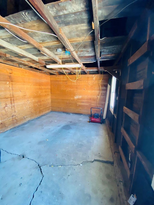 garage with wood walls