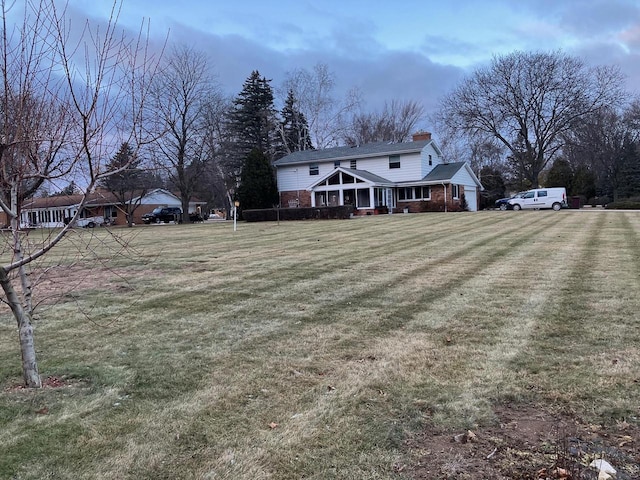 view of yard with covered porch