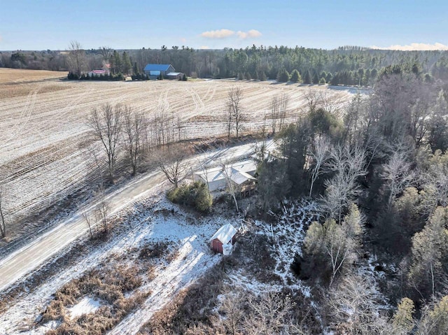 birds eye view of property featuring a rural view