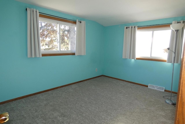 spare room featuring carpet flooring