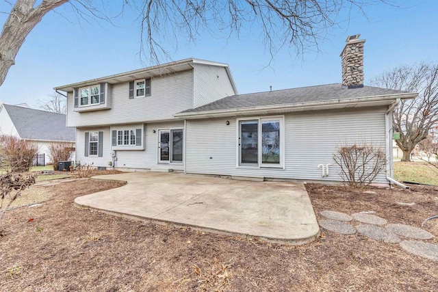 rear view of property with a patio