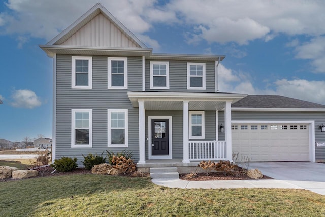 view of front of property with covered porch, a front lawn, and a garage