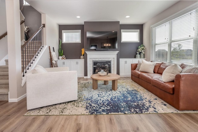 living room with light hardwood / wood-style floors