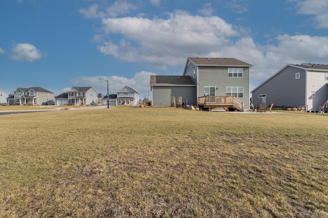 view of yard featuring a wooden deck