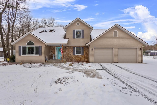 front of property with a garage