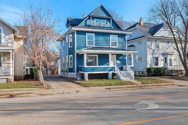 victorian-style house with covered porch