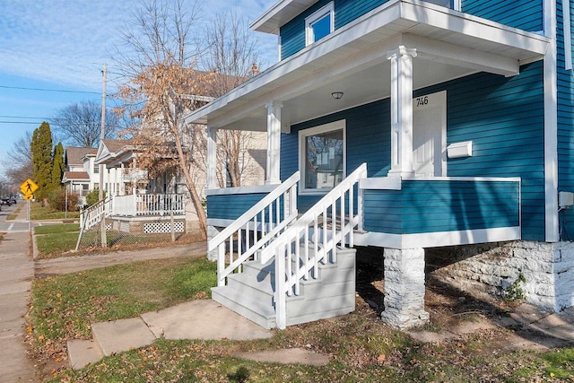 entrance to property with covered porch