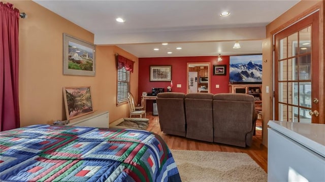 bedroom with light wood-type flooring