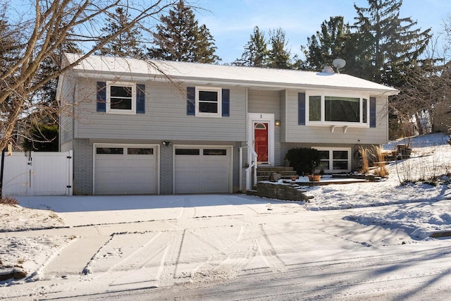 split foyer home featuring a garage