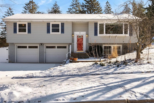 split foyer home featuring a garage