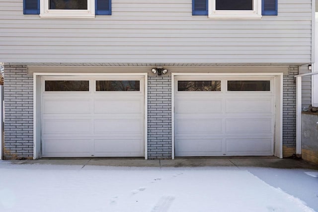 view of snow covered garage