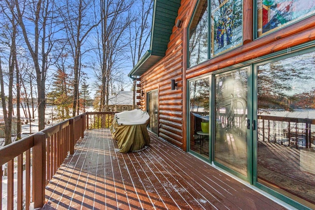 view of snow covered deck