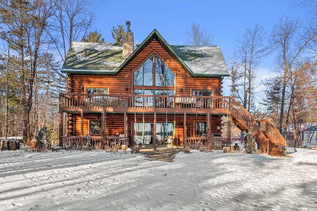 view of front of home with a wooden deck