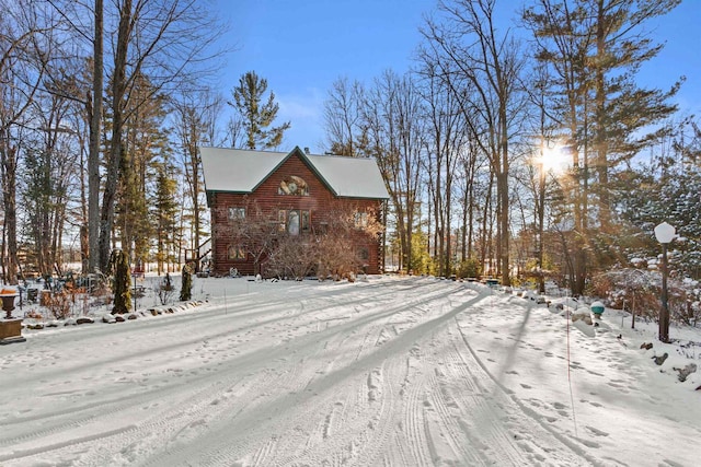 view of snow covered property