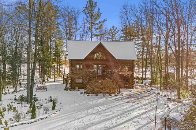 view of log cabin