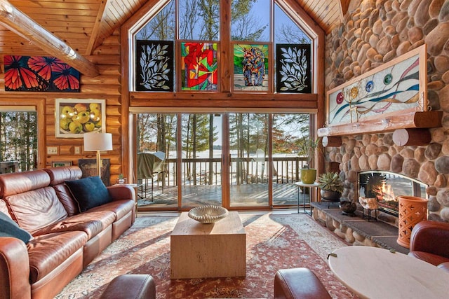 living room featuring log walls, a fireplace, high vaulted ceiling, and wood ceiling