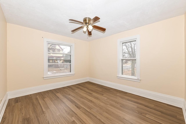 unfurnished room featuring ceiling fan and hardwood / wood-style flooring