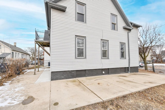 back of property with a patio