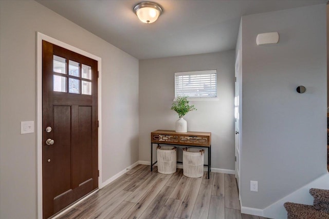 foyer with light wood-type flooring