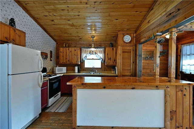 kitchen with white appliances, butcher block counters, wood ceiling, lofted ceiling, and sink