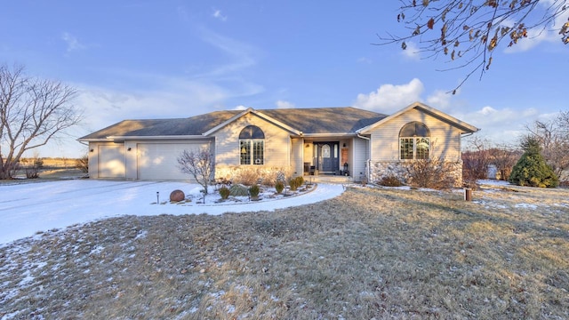 single story home with a garage