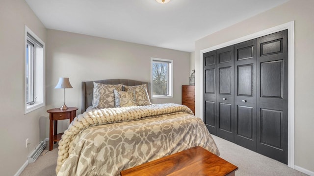 bedroom with a closet and carpet floors