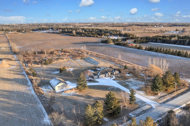 birds eye view of property featuring a rural view