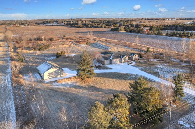 birds eye view of property with a rural view