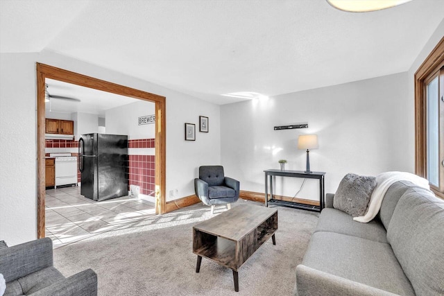 living room featuring vaulted ceiling and light carpet