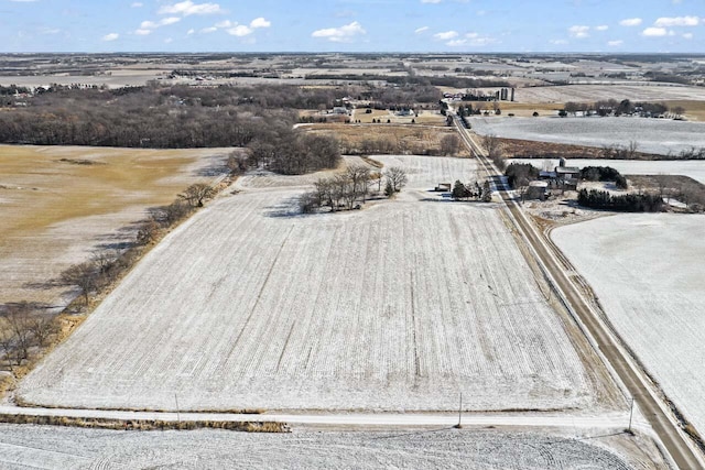 birds eye view of property with a rural view