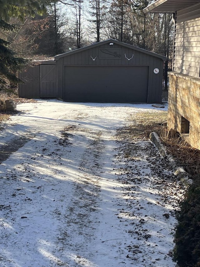 view of snow covered garage